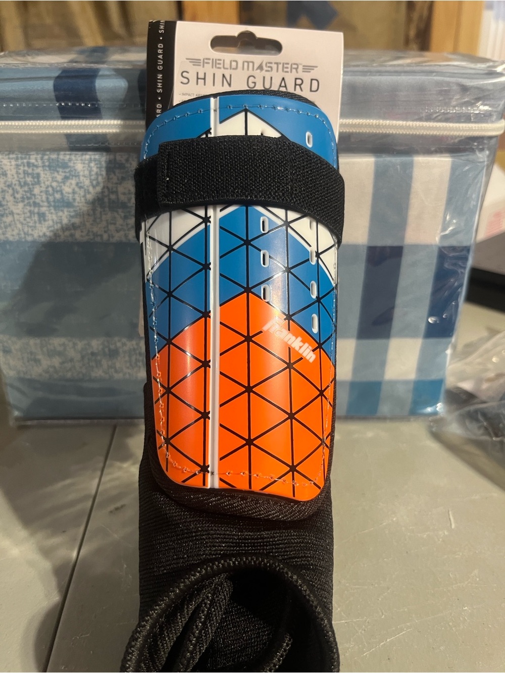 Field Master Youth Shin Guard in Blue and Orange